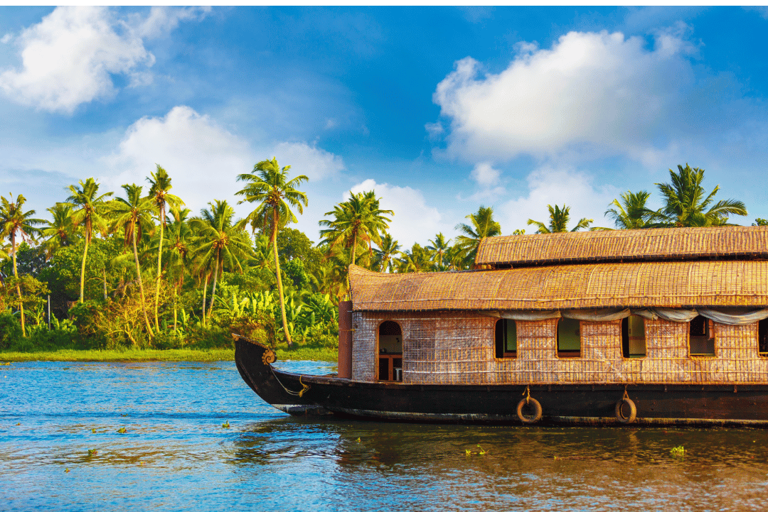 Red traditional Japanese temple with people walking around